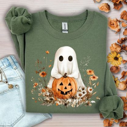 Military Green Halloween Boho Ghost with Jack O'Lantern sweatshirt, surrounded by autumn wildflowers.