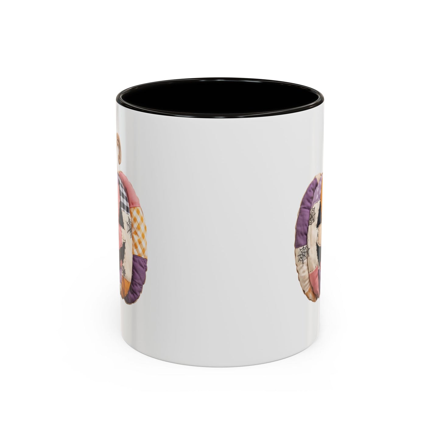 White ceramic mug with black interior and handle, featuring a colorful quilted jack-o'-lantern design.