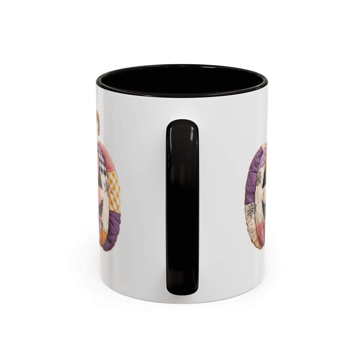 White ceramic mug with black handle and interior, featuring a quilted patchwork jack-o'-lantern design.