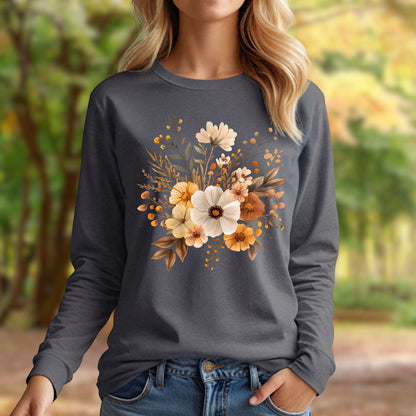Charcoal long sleeve tee with a muted autumn floral design, worn by a woman in a fall outdoor setting.