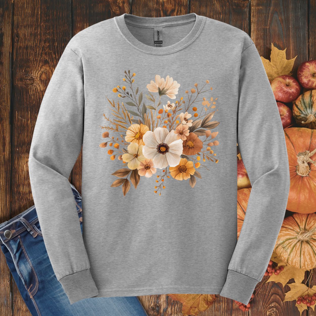 Ash gray Gildan long sleeve tee with a muted autumn floral design, 100% cotton.