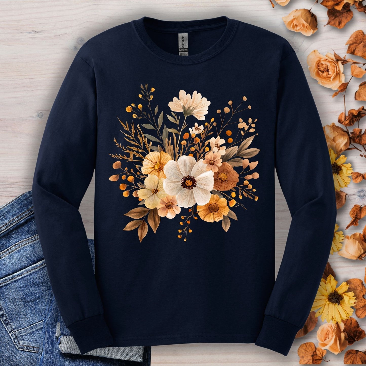 Navy Gildan long sleeve tee with a muted autumn floral design, 100% cotton.