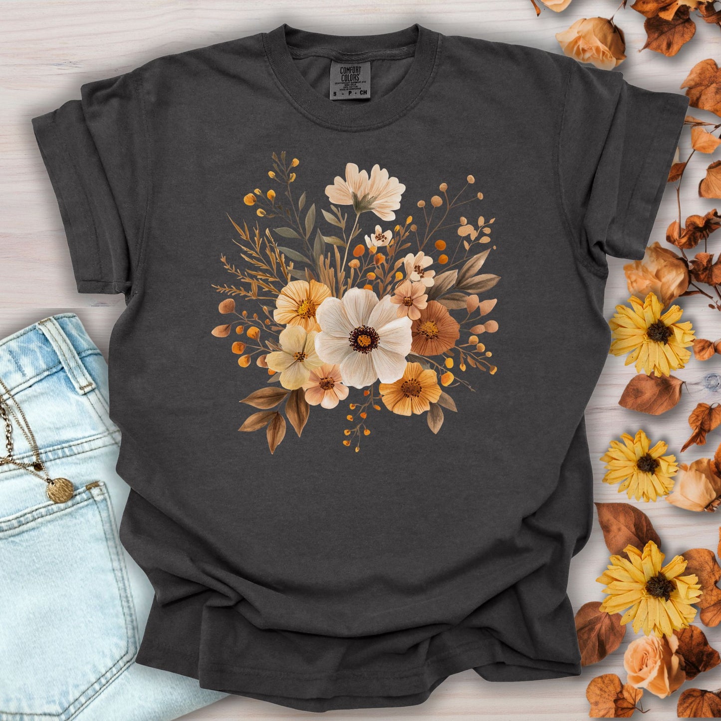 Pepper garment-dyed t-shirt with a warm bouquet of autumn-hued blooms at the chest.