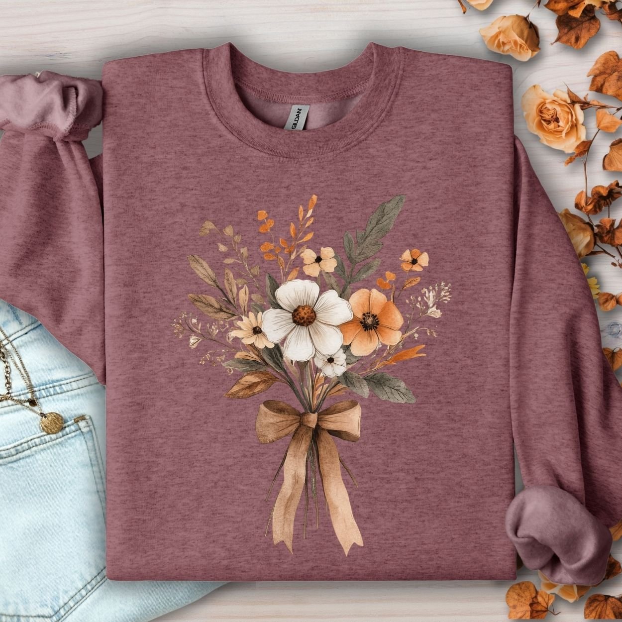Heather Sport Dark Maroon sweatshirt with a watercolor harvest bouquet and light brown bow.