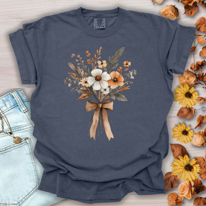 Denim blue relaxed-fit t-shirt with a watercolor autumn floral bouquet and brown ribbon.
