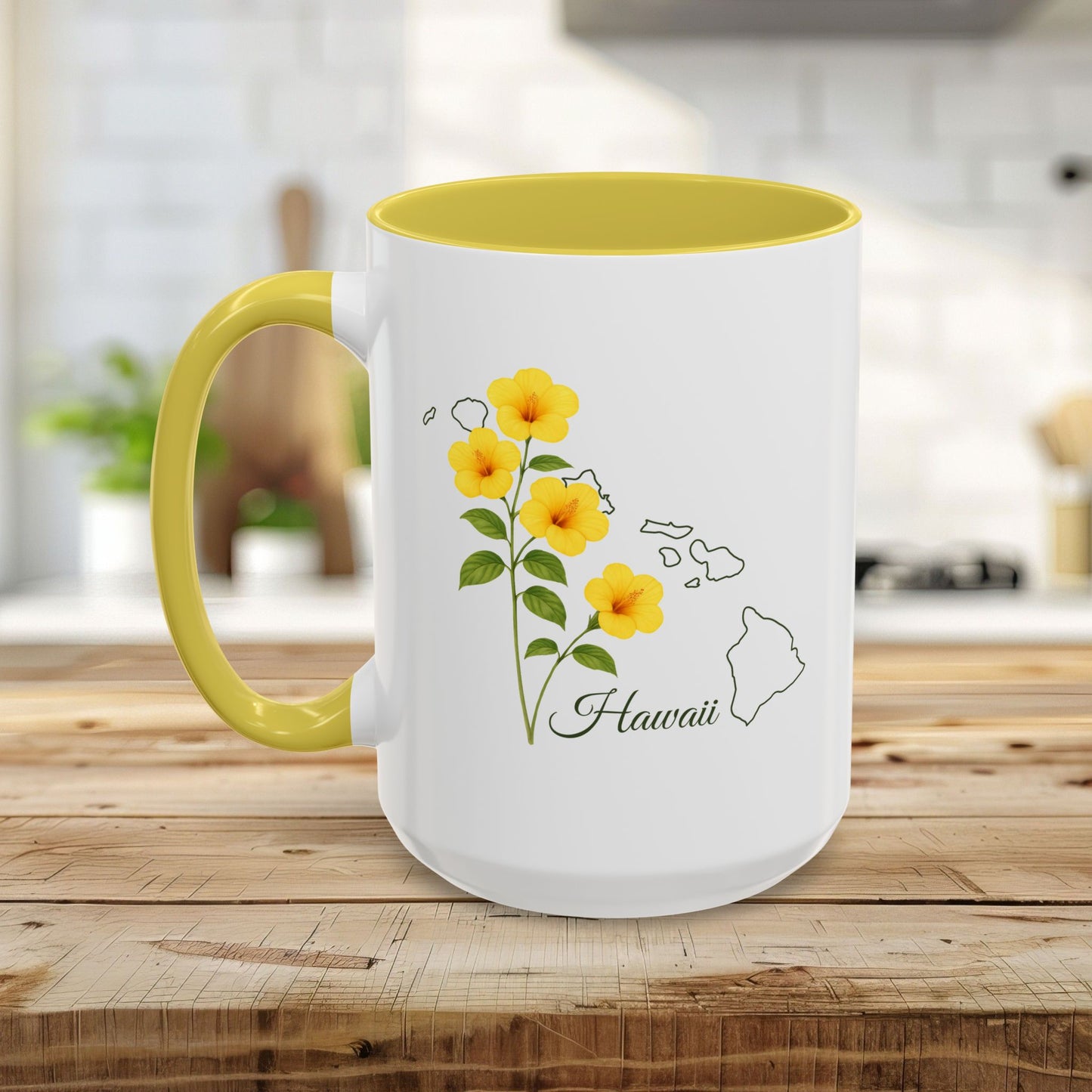 White ceramic mug with yellow hibiscus flowers, "Hawaii" text, and an outline of the Hawaiian islands.