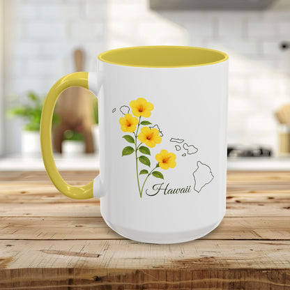 White ceramic mug with yellow hibiscus flowers, "Hawaii" text, and an outline of the Hawaiian islands.