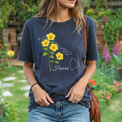 Relaxed-fit, garment-dyed navy t-shirt with yellow hibiscus flowers and a Hawaii island outline.