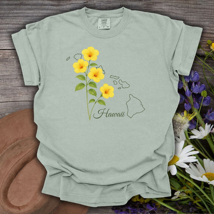 Bay-colored, relaxed-fit cotton tee with yellow hibiscus flowers and a Hawaii island outline.