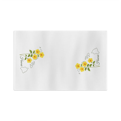 White microfiber tea towel with yellow hibiscus flowers and a subtle Hawaii island map print.