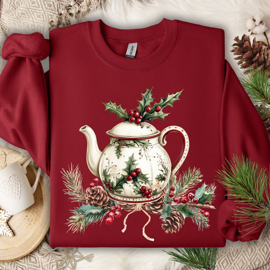 Cardinal Red Gildan sweatshirt with a vintage Christmas teapot, holly, and pinecone design.
