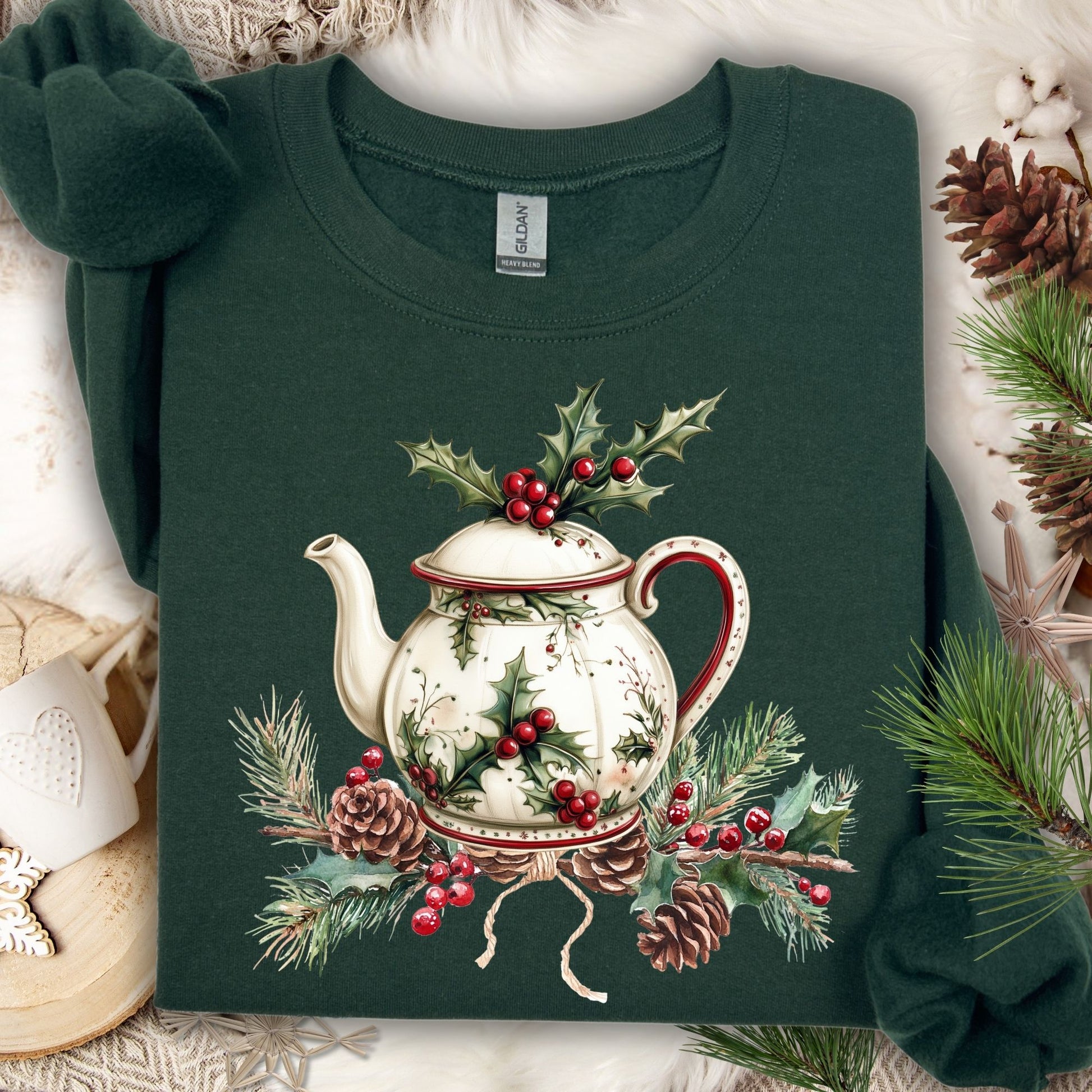 Forest Green Gildan sweatshirt with a vintage Christmas teapot, holly, and pinecone design.