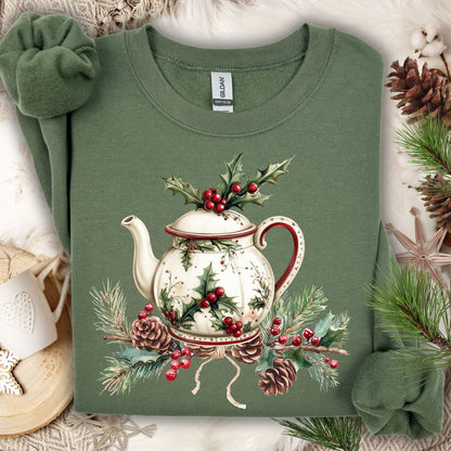 Military Green Gildan sweatshirt with a vintage Christmas teapot, holly, pine, and berries design.