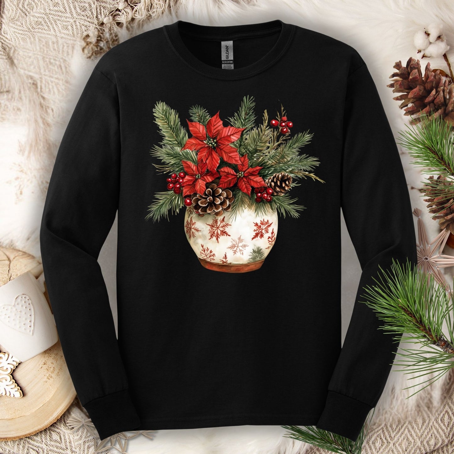Black Gildan long sleeve tee with a watercolor holiday floral arrangement in a snowflake ceramic pot.