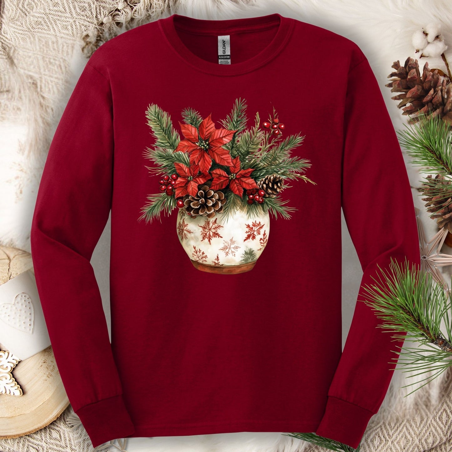 Cardinal Red Gildan long sleeve tee with a watercolor holiday floral arrangement in a snowflake ceramic pot.