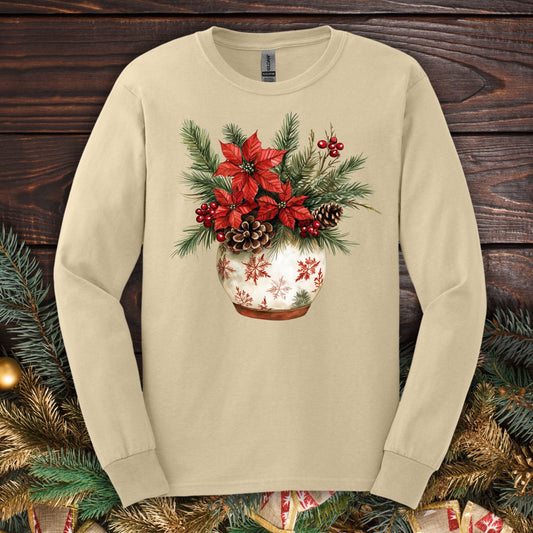 Sand Gildan long sleeve tee with a watercolor holiday floral arrangement in a snowflake ceramic pot.