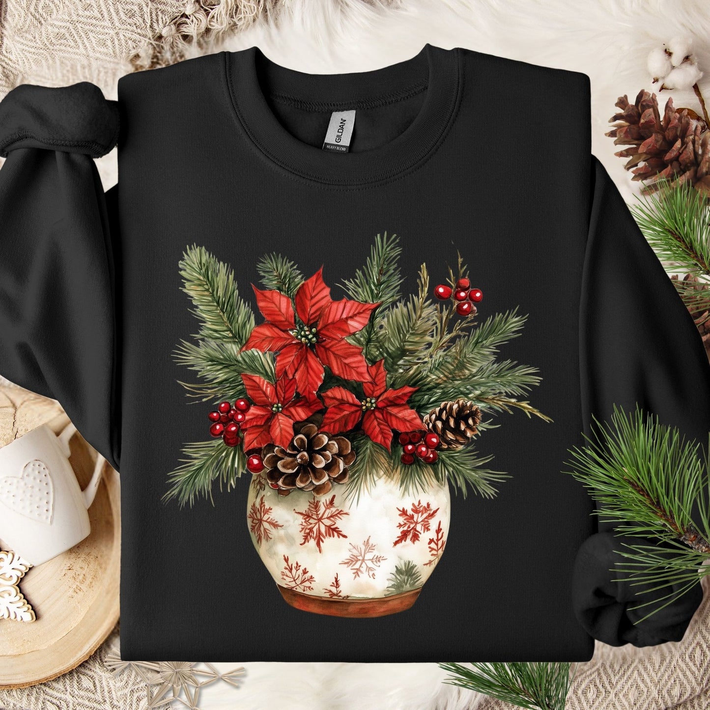 Black Gildan long sleeve tee with watercolor holiday floral arrangement in a snowflake ceramic pot.