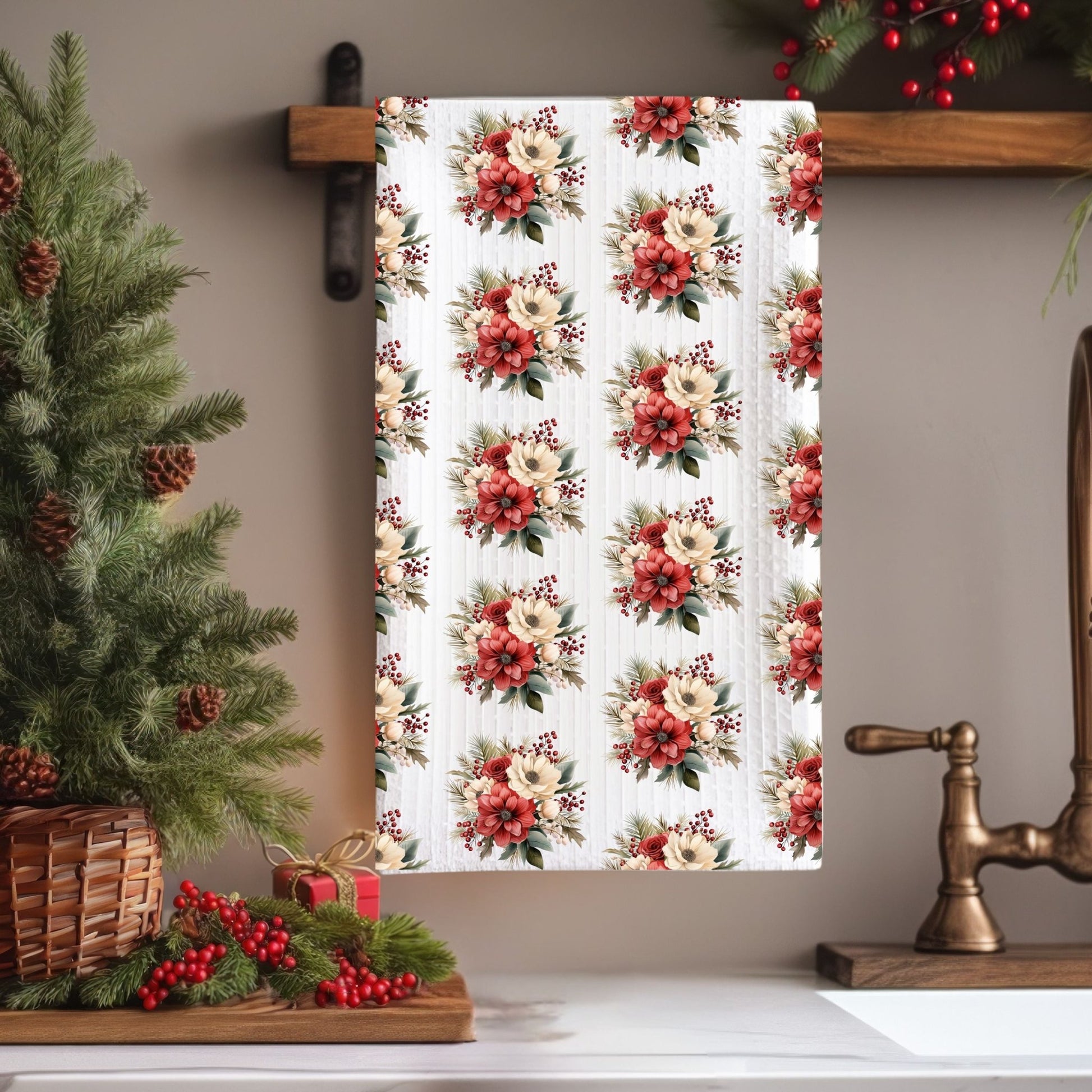 White microfiber tea towel with vintage red and cream floral bouquets, hanging in a kitchen.