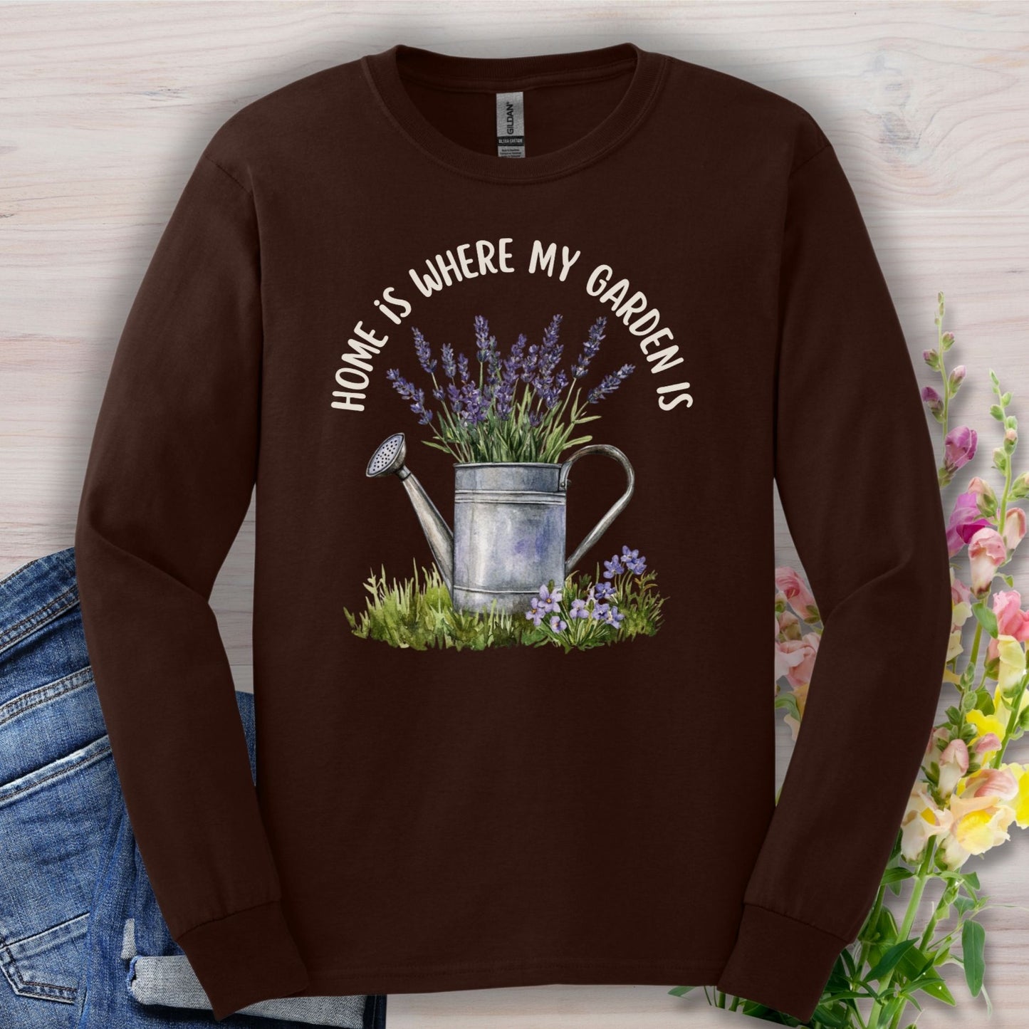 Dark chocolate long sleeve tee, size S, with a watercolor watering can, lavender, and "home is where my garden is" text.
