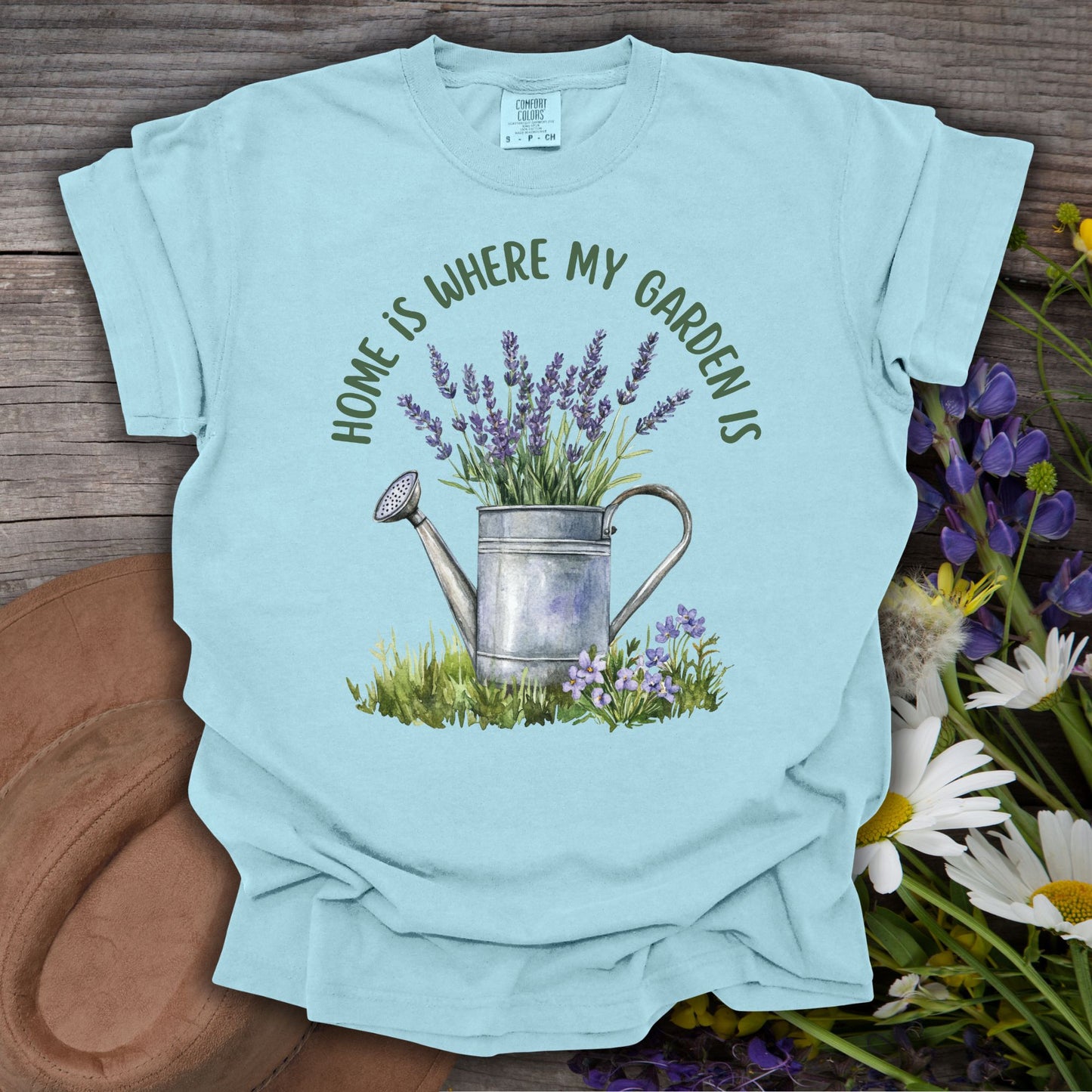 Chambray blue cotton t-shirt with "Home Is Where My Garden Is" text and a watercolor watering can with lavender.