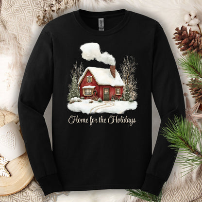 Black Gildan long sleeve tee with a watercolor red winter cabin and "Home for the Holidays" script.