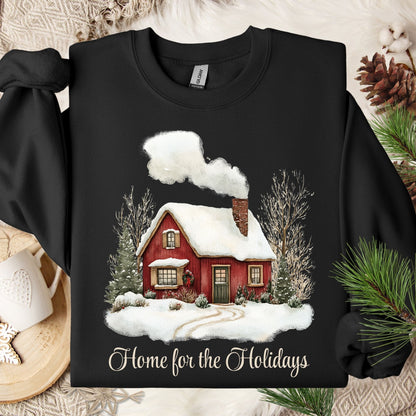 Black Gildan fleece sweatshirt with vintage watercolor red cabin and "Home for the Holidays" text.
