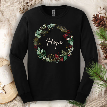 Black long sleeve tee with a watercolor Christmas wreath and "Hope" in the center.