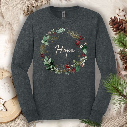 Dark heather long sleeve tee with a watercolor "Hope" Christmas wreath design.