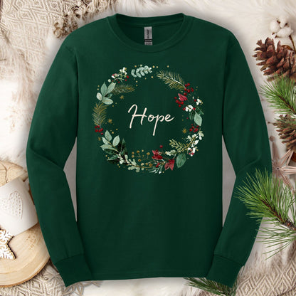 Forest Green long sleeve tee with a watercolor Christmas wreath and "Hope" at its center.