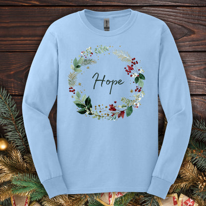 Light blue long sleeve tee with a watercolor "Hope" Christmas wreath design.
