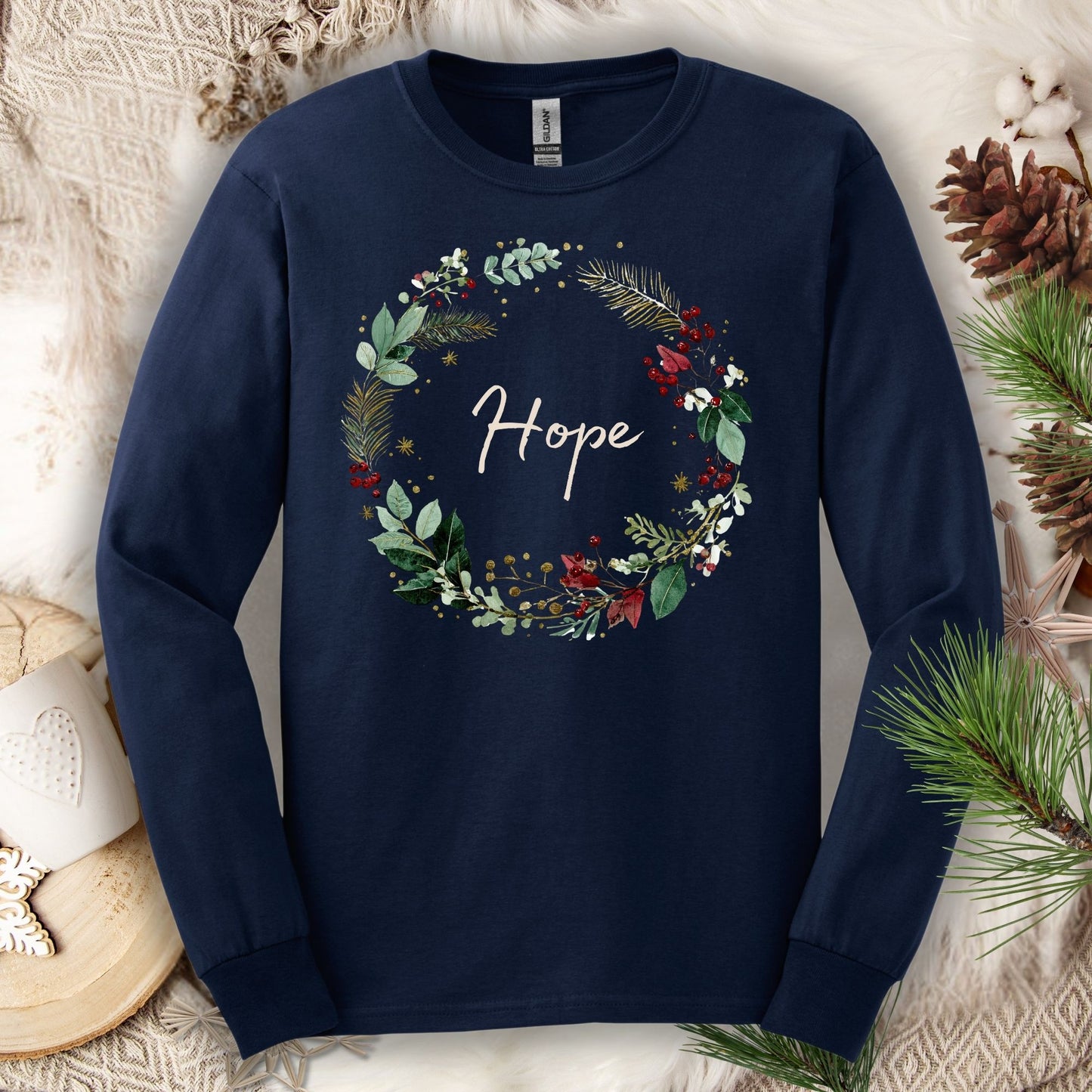 Navy long sleeve tee with a watercolor "Hope" Christmas wreath design.
