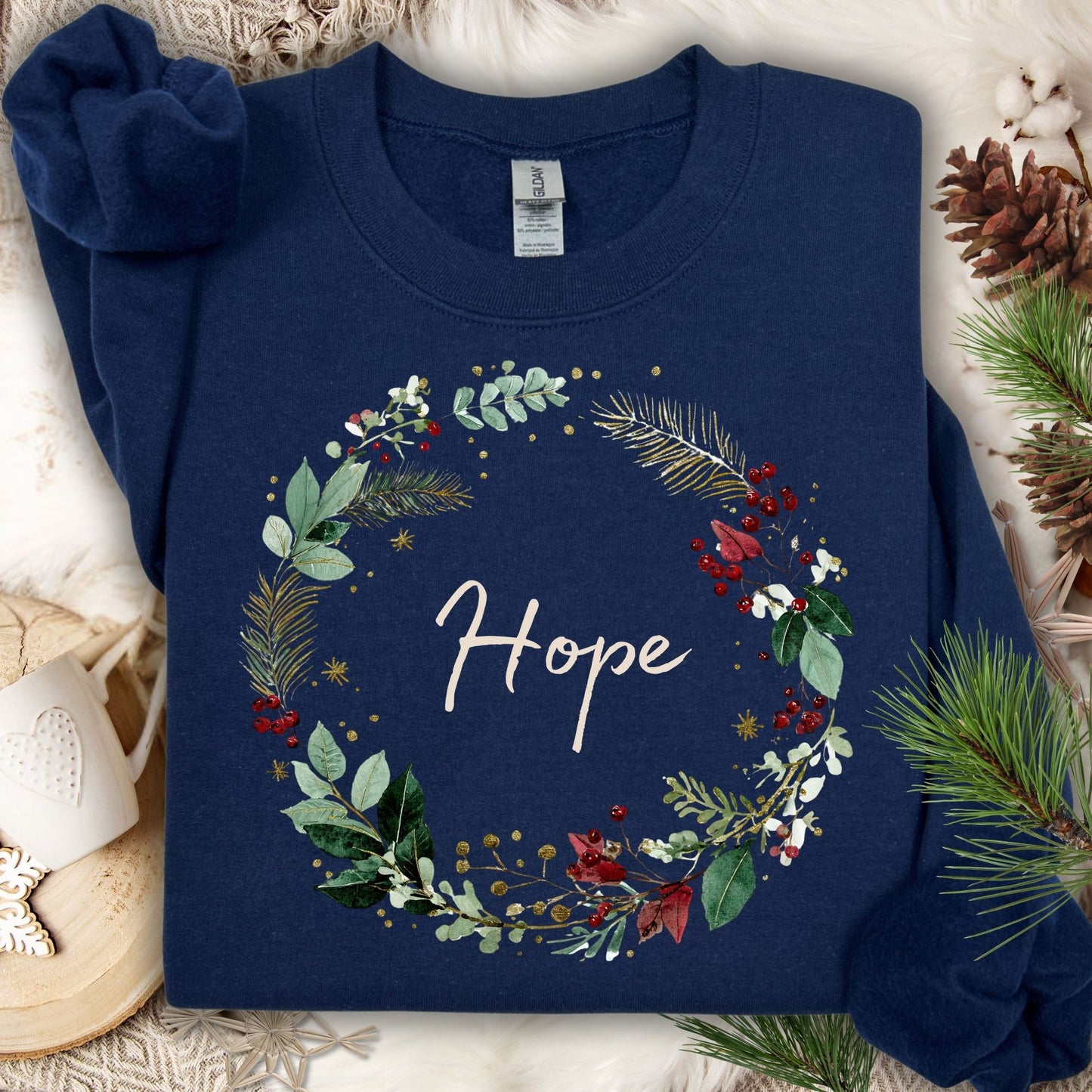 Navy Gildan sweatshirt with a watercolor Christmas wreath and "Hope" in the center.