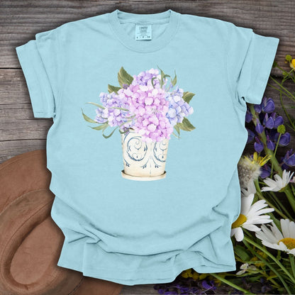 Chambray S t-shirt with a watercolor-style hydrangea bouquet in a vintage ceramic vase.