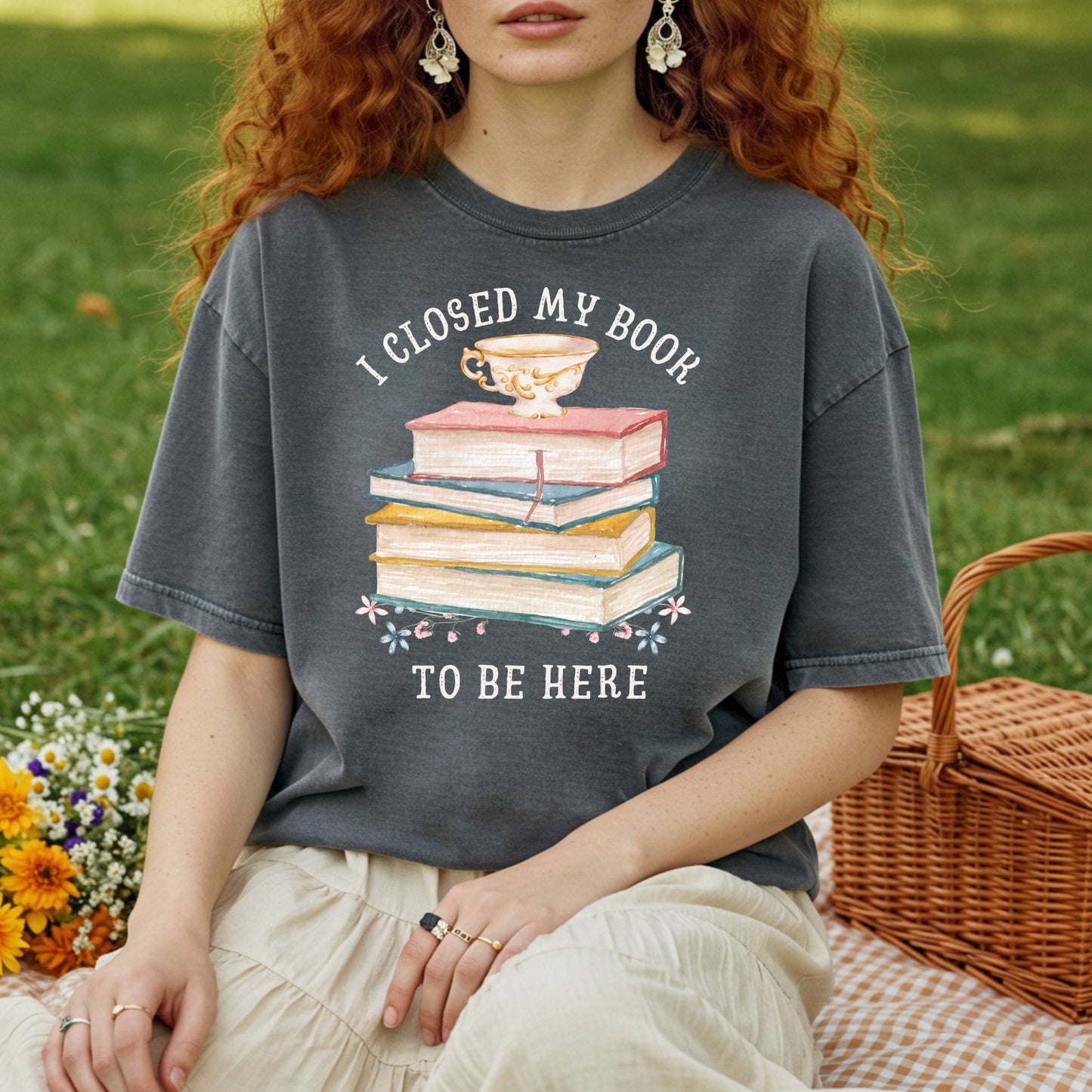Vintage charcoal t-shirt with "I Closed My Book To Be Here" text, watercolor books, teacup, and florals.