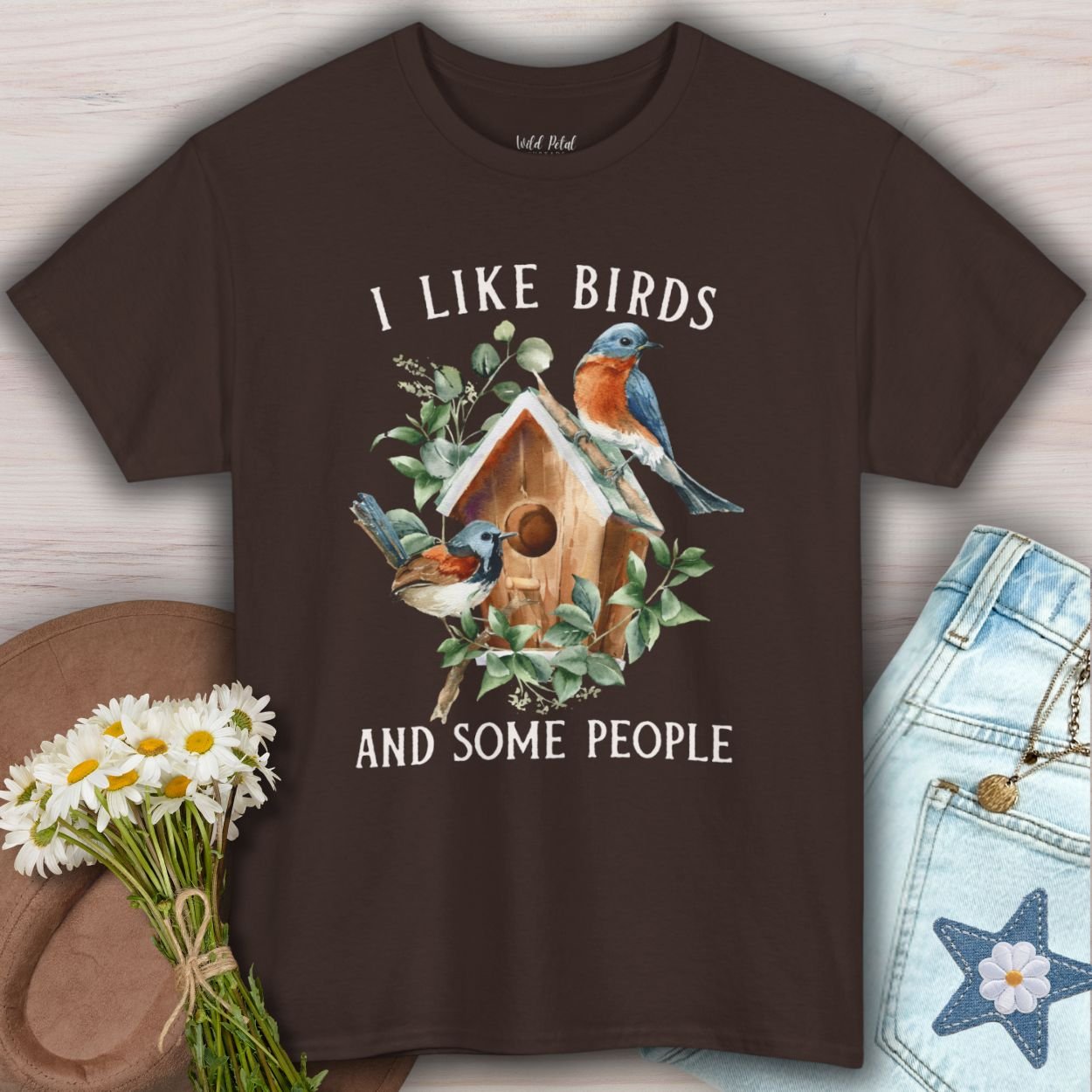 Dark Chocolate S tee with "I like birds and some people" text and bluebird watercolor art.