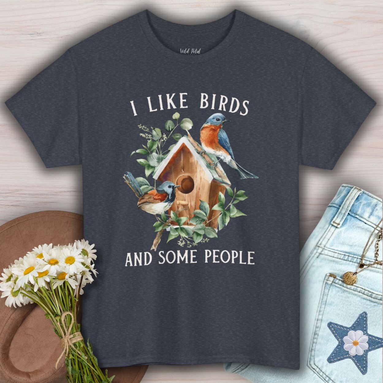 Heather Navy S t-shirt with "I like birds and some people" text and a watercolor birdhouse with bluebirds.