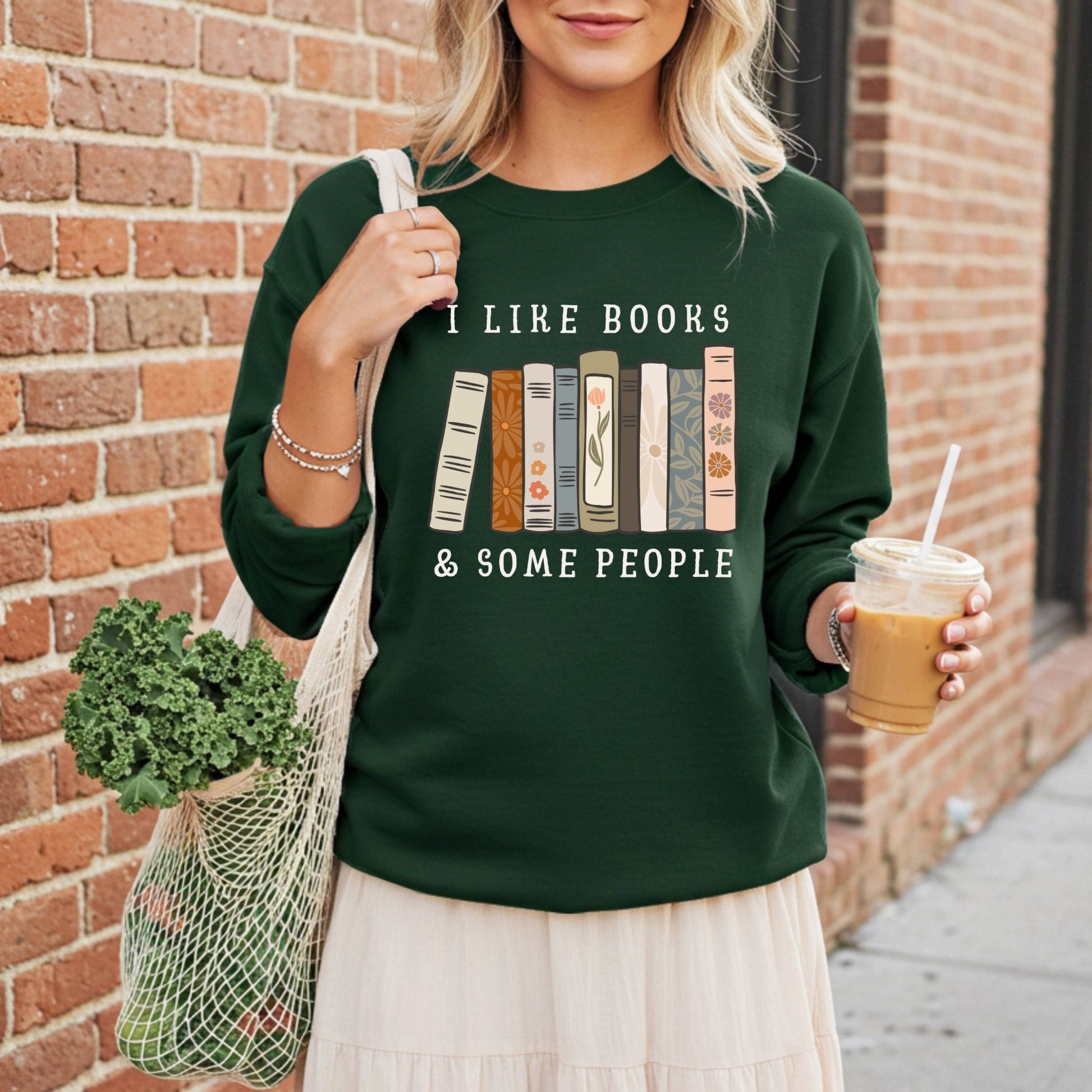 Dark green Gildan crewneck sweatshirt with "I like books & some people" and vintage book graphic.