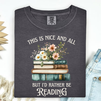 Pepper Comfort Colors t-shirt with "This is nice and all but I'd rather be reading" text and vintage books with wildflowers.