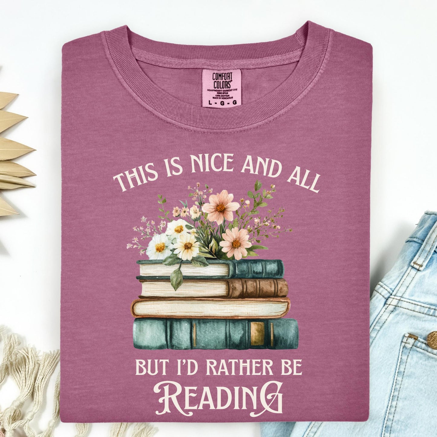 Berry Comfort Colors tee with "This is nice and all but I'd rather be reading" text, vintage books, and wildflowers.