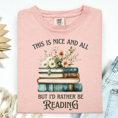 Peachy Comfort Colors t-shirt with "This is nice and all but I'd rather be reading" text, vintage books, and wildflowers.