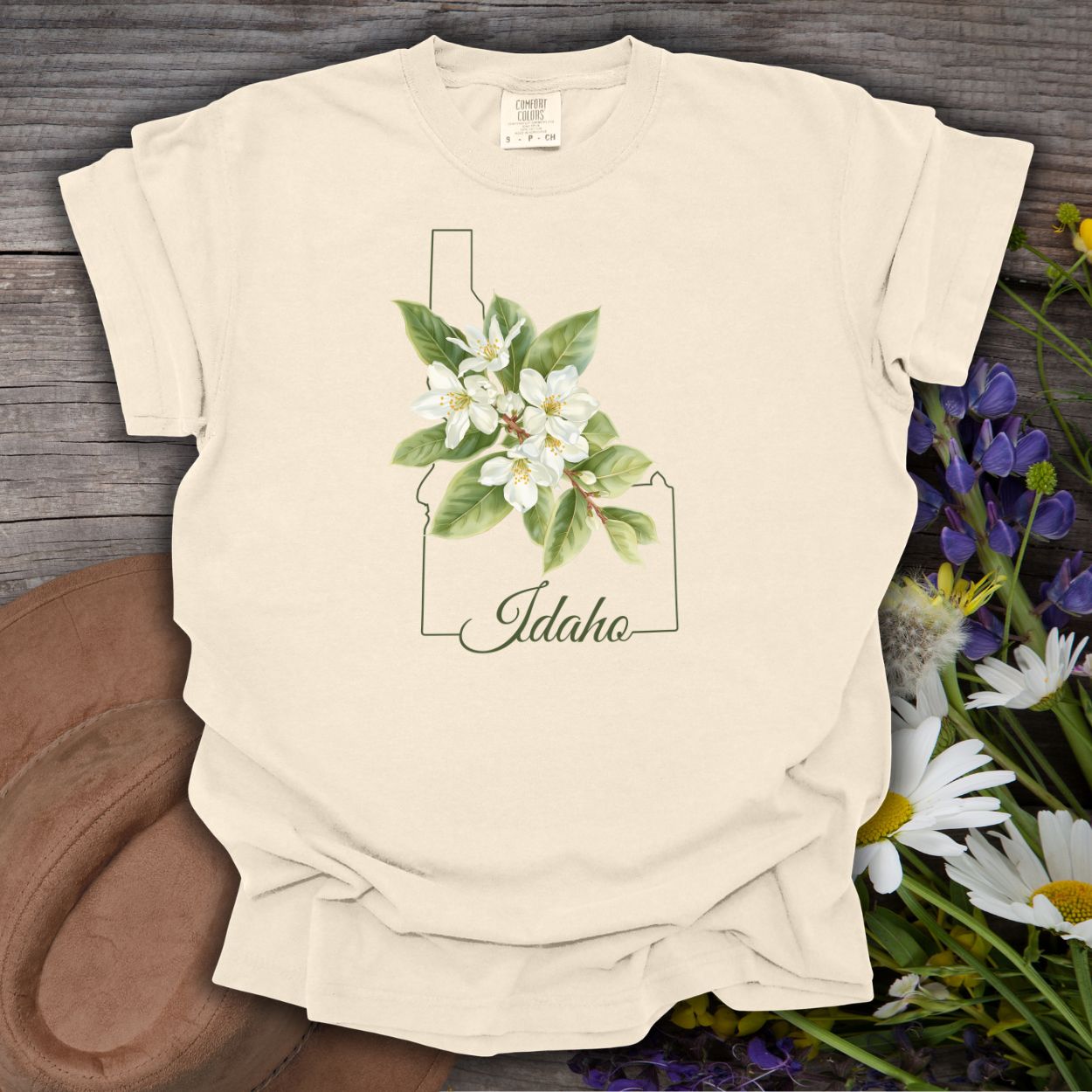 Ivory cotton t-shirt with Idaho outline and white Syringa blossoms design.
