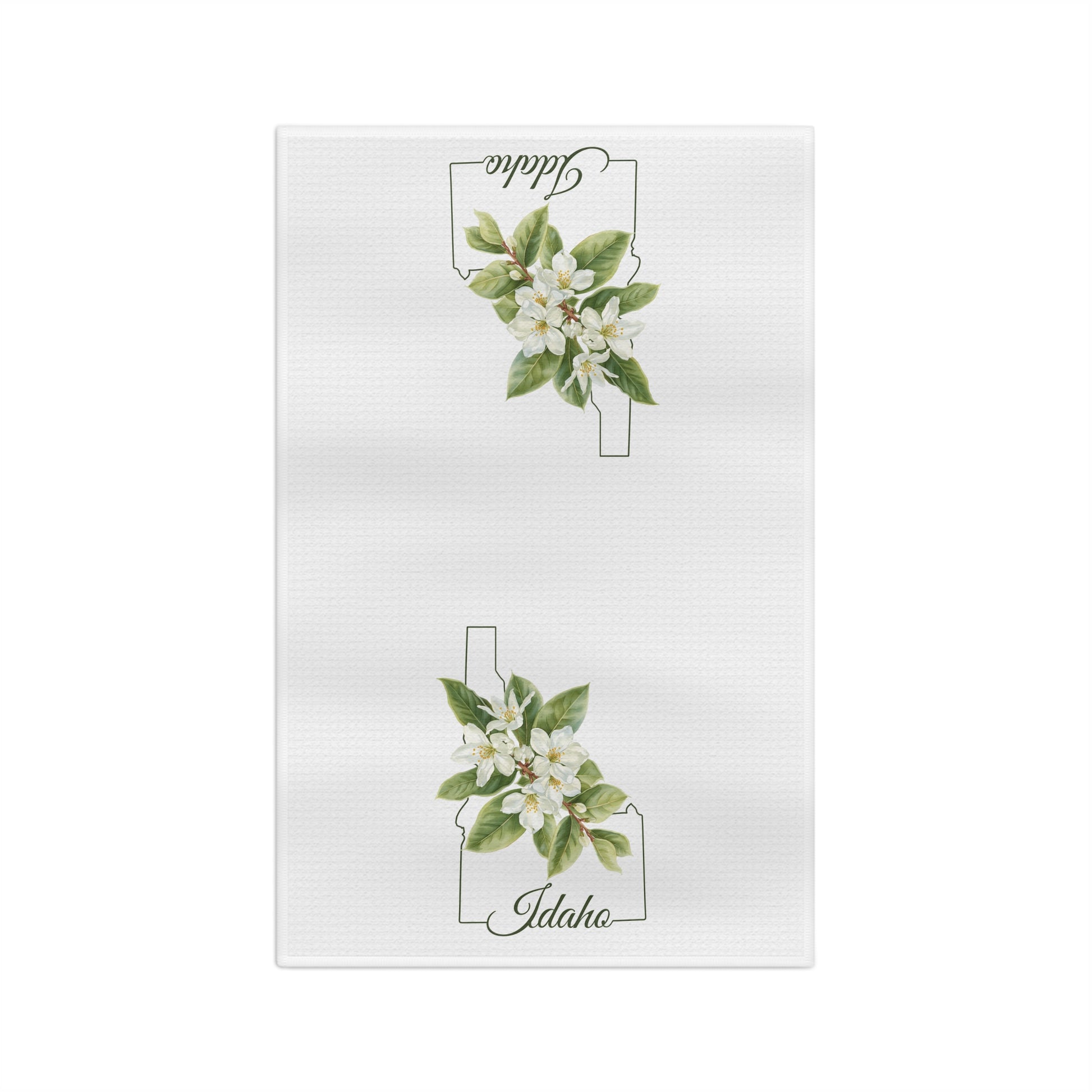 White microfiber tea towel with Idaho state outline and Syringa (mock orange) blossoms.