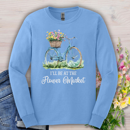 Carolina Blue long sleeve tee with a vintage bicycle, flower basket, and "I'll Be At The Flower Market" text.
