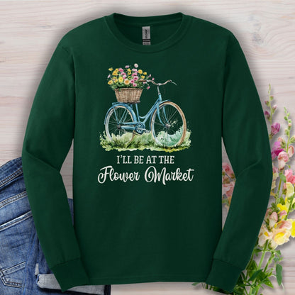 Forest Green long-sleeve cotton tee with a blue bicycle and flower basket graphic, "Flower Market" text.