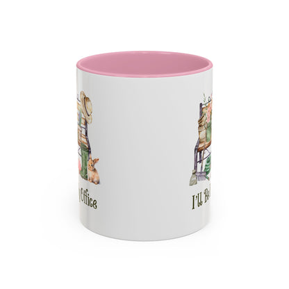 White ceramic gardener mug with pink interior and "I'll Be In My Office" text, featuring watercolor garden tools and a bunny.