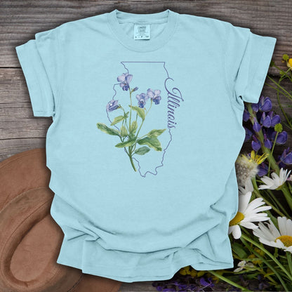 Chambray blue cotton t-shirt with a delicate common blue violet illustration over an Illinois state outline.