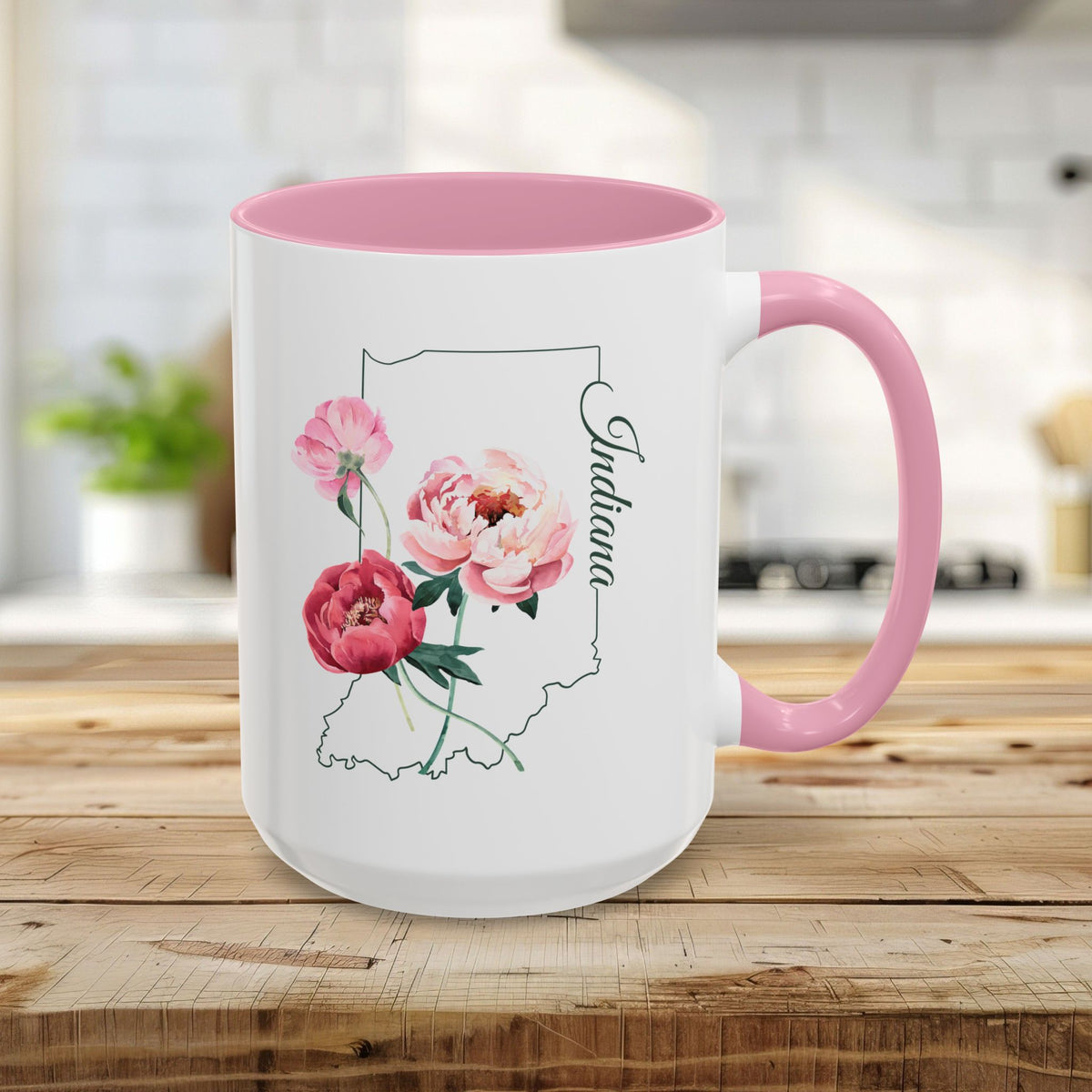 White 15oz ceramic mug with pink interior/handle, Indiana state outline, and soft pink peony watercolor print.
