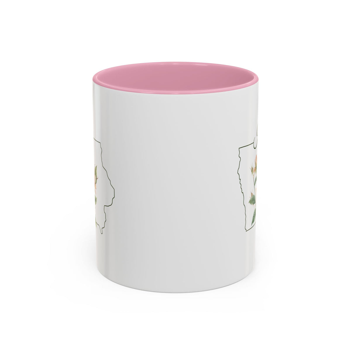 White ceramic mug with pink interior and handle, featuring a Wild Prairie Rose illustration inside an Iowa silhouette.
