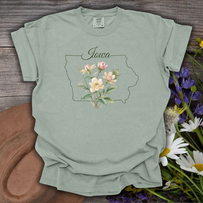Bay green garment-dyed cotton t-shirt with an Iowa state outline and wild prairie rose bouquet design.