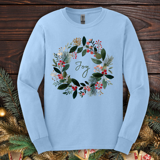Light blue Gildan long sleeve tee, size S, with a watercolor "Joy" Christmas wreath design.